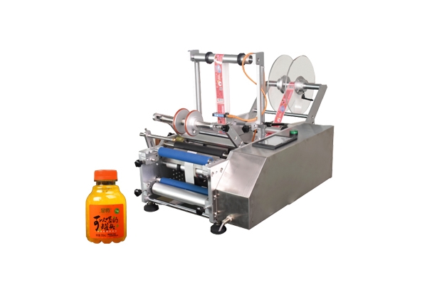 半自動(dòng)果汁瓶貼標(biāo)機(jī)